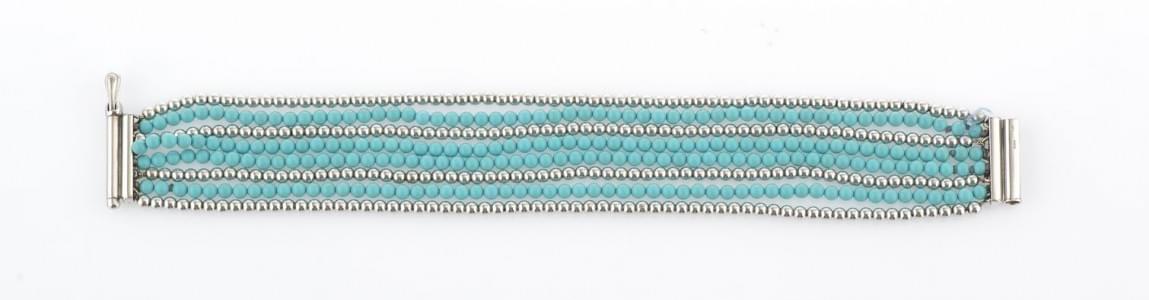 Bracelet serti de perles de turquoises et d'or gris