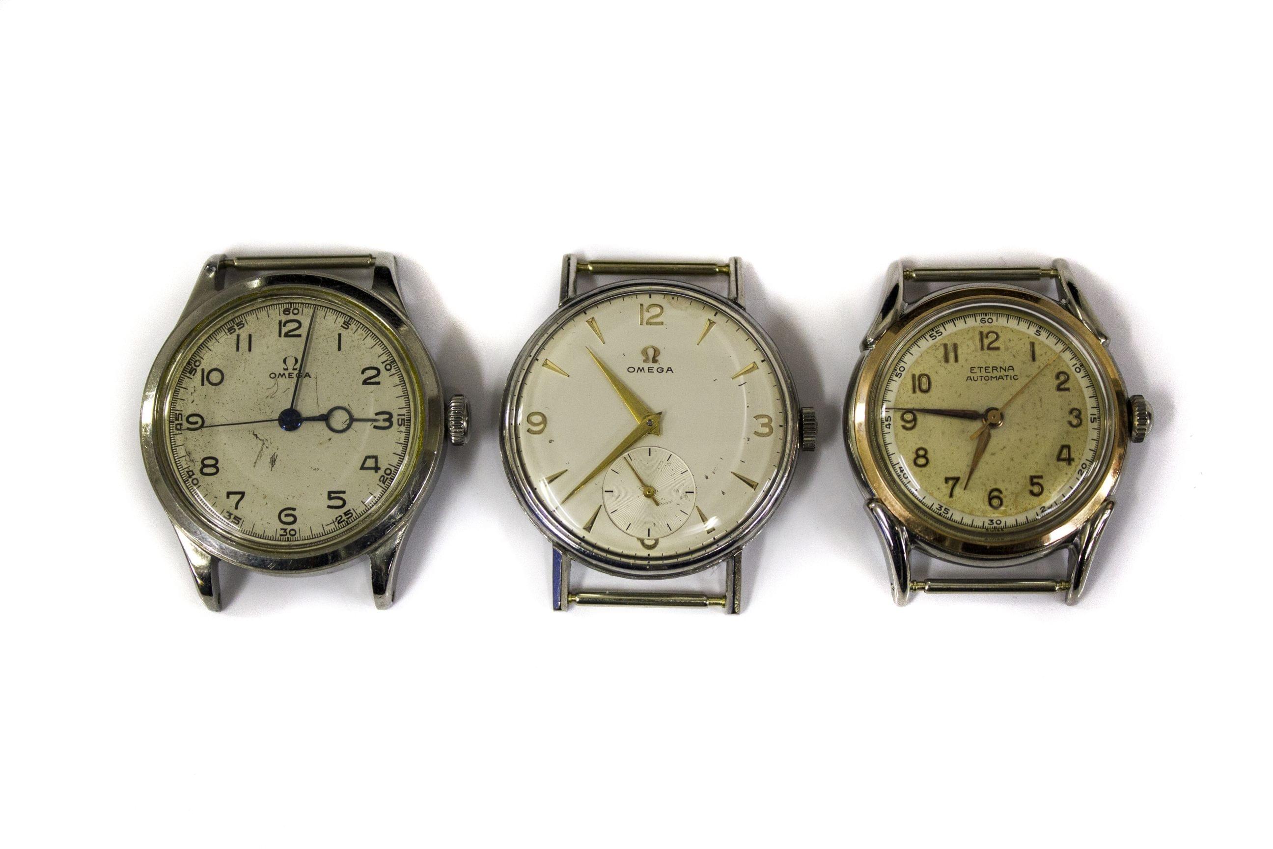 Omega et Eterna, lot de trois montres mécaniques et automatiques sans bracelet
