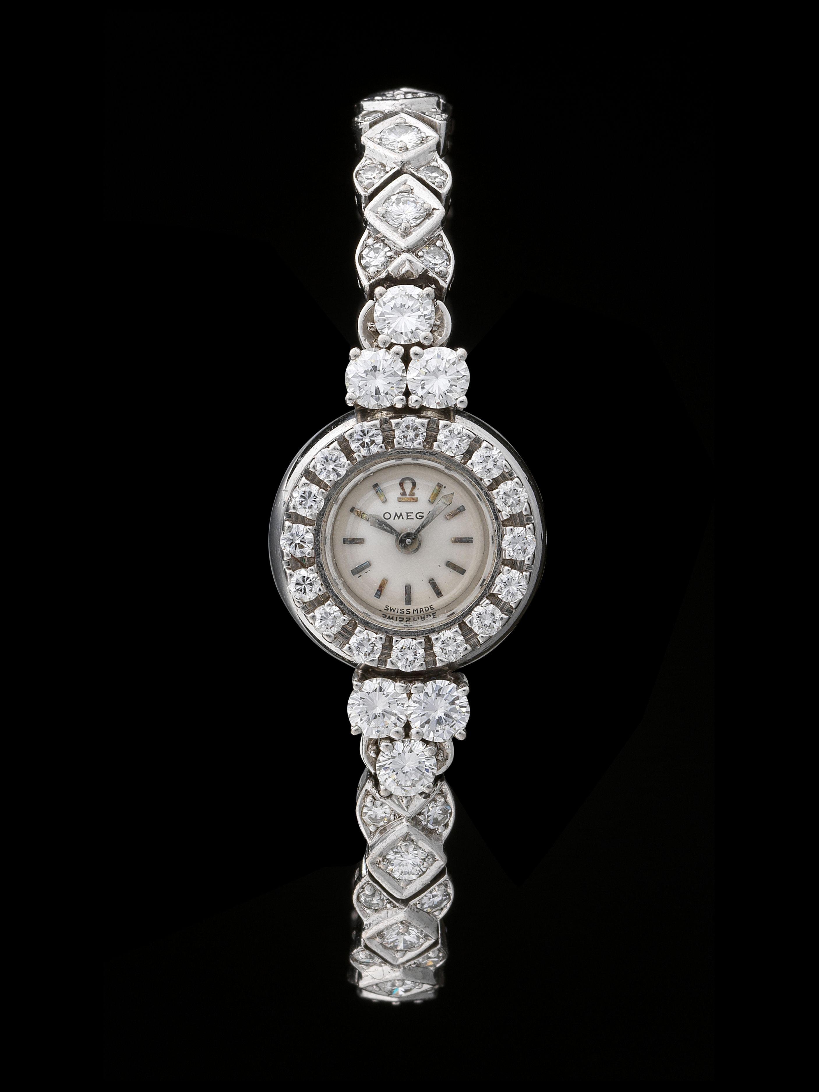 Omega, montre-bracelet ronde mécanique entièrement pavée de diamants (total env. 3 ct)