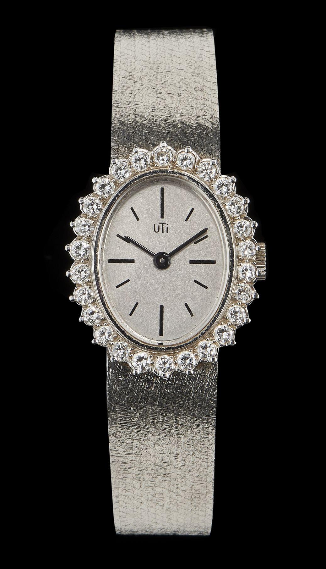 Uti, montre-bracelet ovale mécanique sertie de diamants
